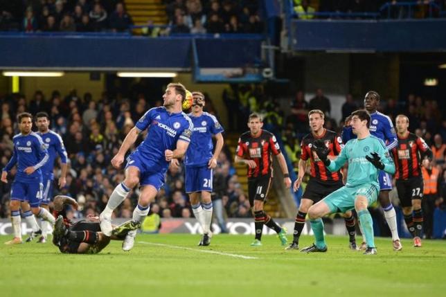 football soccer   chelsea v afc bournemouth   barclays premier league   stamford bridge   5 12 15chelsea 039 s thibaut courtois and branislav ivanovic in action before bournemouth 039 s glenn murray scores their first goalaction photo reuters