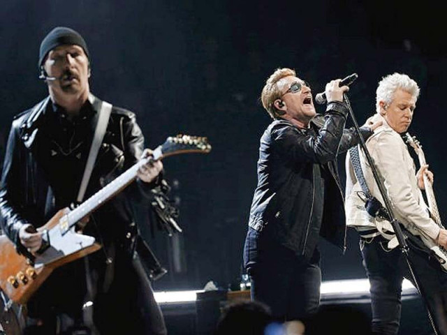bono c the edge l and adam clayton of irish band u2 perform during their concert at the accorhotels arena in paris photo reuters bono c the edge l and adam clayton of irish band u2 perform during their concert at the accorhotels arena in paris photo reuters