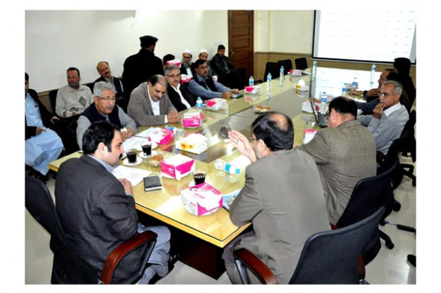 senior minister for irrigation sikandar hayat khan sherpao being briefed about small dams in the province photo express senior minister for irrigation sikandar hayat khan sherpao being briefed about small dams in the province photo express
