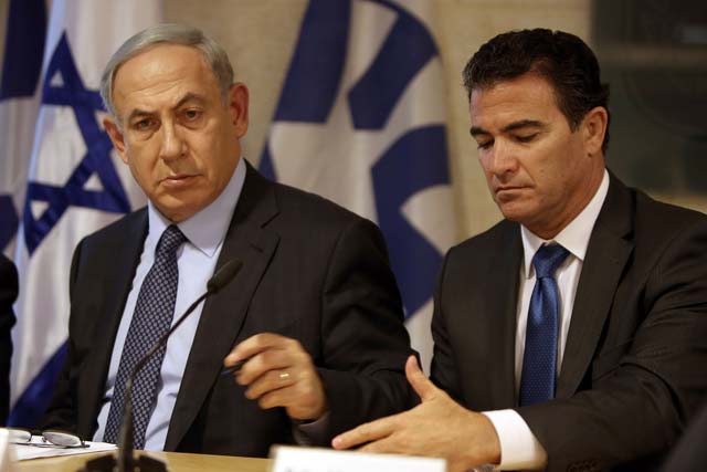 a file picture taken at the israeli foreign ministry on october 15 2015 shows prime minister benjamin netanyahu l sitting next to yossi cohen who is currently the head of israel 039 s national security council and who was named as the 12th head of the mossad intelligence agency by netanyahu on december 7 2015 cohen will take over from outgoing mossad head tamir pardo who will be leaving his post after five years next january photo afp