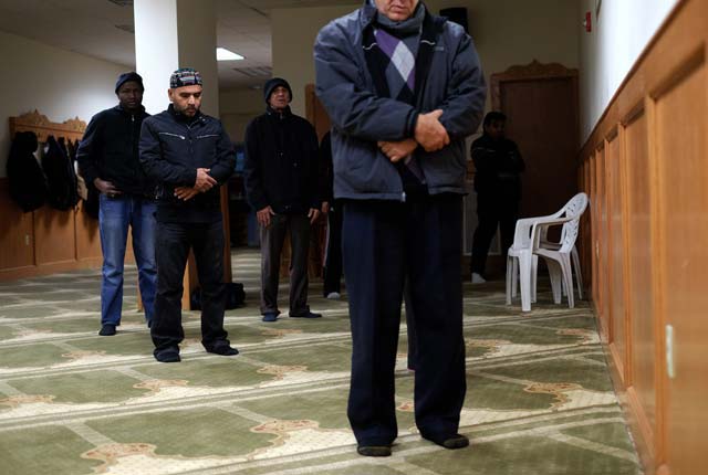 muslim men pray at a mosque in jersey city new jersey on december 7 2015 muslim american leaders accused republican presidential hopeful donald trump of incitement for demanding a quot complete shutdown quot of muslims entering the us after a new york shopkeeper was beaten in an alleged hate crime trump 039 s stunning statement followed last week 039 s mass shooting in california by a muslim couple believed to have been radicalized by extremists and landed with a thunderclap just as fellow presidential candidates were contemplating ways to improve national security photo afp