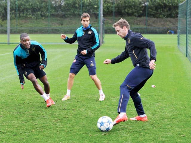 arsenal players train ahead of their must win clash against olympiakos photo courtesy arsenal com arsenal players train ahead of their must win clash against olympiakos photo courtesy arsenal com