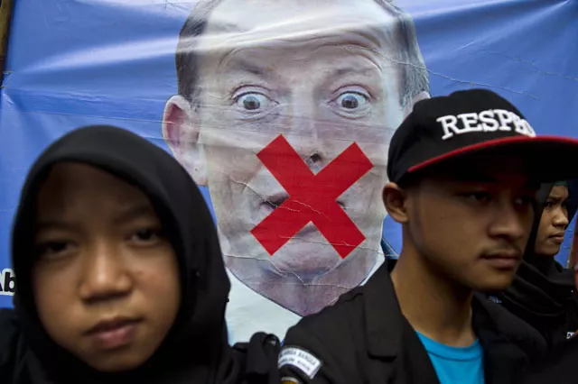 in this file picture taken on march 10 2015 indonesian demonstrators rally in front of a vandalized portrait of australian prime minister tony abbott during a protest outside the australian embassy in jakarta photo afp in this file picture taken on march 10 2015 indonesian demonstrators rally in front of a vandalized portrait of australian prime minister tony abbott during a protest outside the australian embassy in jakarta photo afp