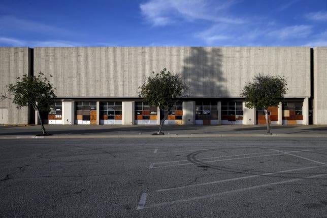 windows are boarded up at a former automotive repair store at the carousel mall in san bernardino california on december 7 2015 picture taken december 7 2015 photo reuters