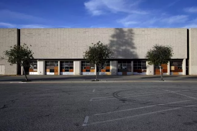 windows are boarded up at a former automotive repair store at the carousel mall in san bernardino california on december 7 2015 picture taken december 7 2015 photo reuters