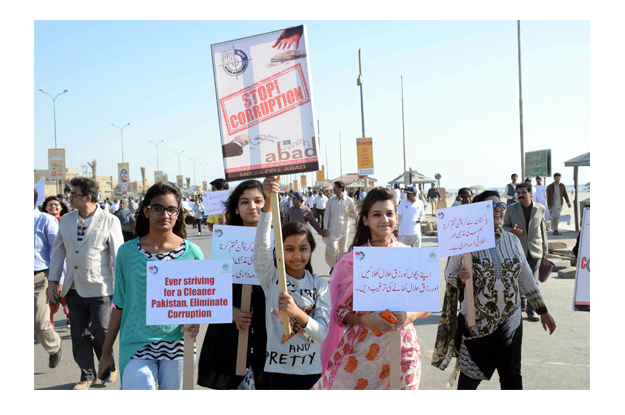 participants at an awareness walk at sea view clifton organised by the national accountability bureau nab sindh photo express