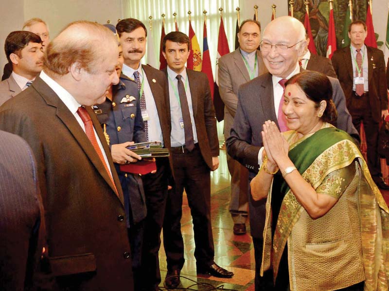 indian foreign minister sushma swaraj greets prime minister nawaz sharif in islamabad photo nni
