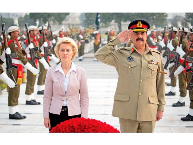 german defence minister ursula von der leyen and general raheel sharif pay their respects at yadgar e shuhada photo afp german defence minister ursula von der leyen and general raheel sharif pay their respects at yadgar e shuhada photo afp