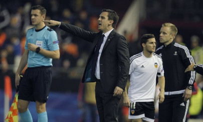 neville seeks fresh valencia after poor start
