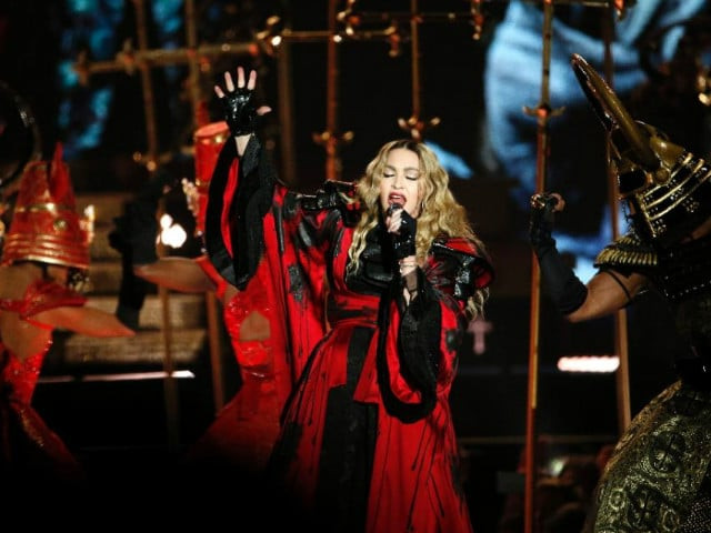 madonna sang the french national anthem bringing the concert goers to their feet photo afp madonna sang the french national anthem bringing the concert goers to their feet photo afp