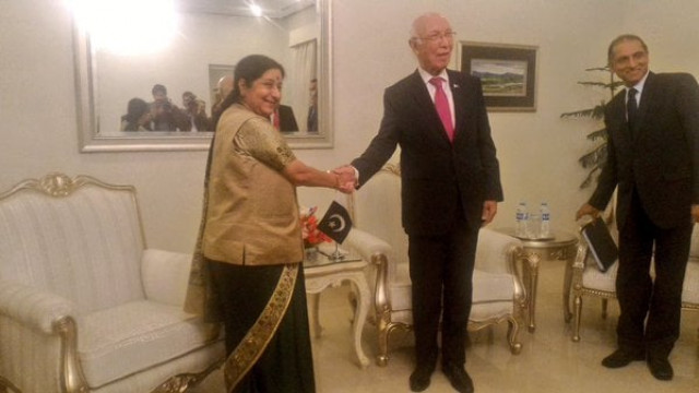 indian external affairs minister suhsma swaraj shakes hands with adviser to pm on foreign affairs sartaj aziz in islamabad on december 9 2015 photo twitter emaindia indian external affairs minister suhsma swaraj shakes hands with adviser to pm on foreign affairs sartaj aziz in islamabad on december 9 2015 photo twitter emaindia