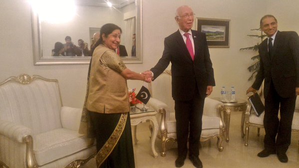 indian external affairs minister suhsma swaraj shakes hands with adviser to pm on foreign affairs sartaj aziz in islamabad on december 9 2015 photo twitter emaindia