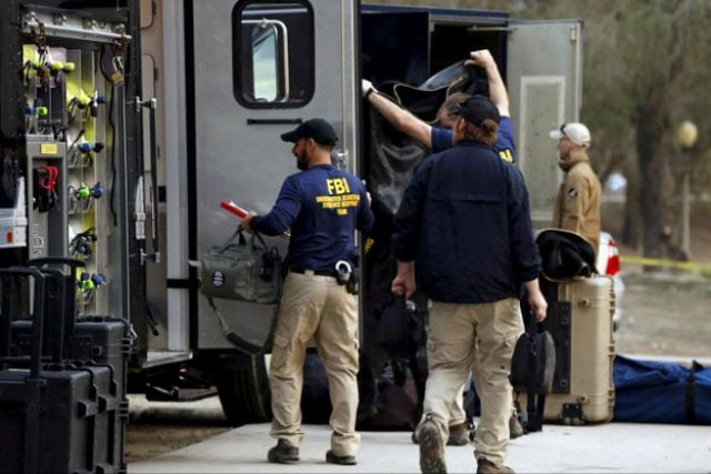 fbi agents pack up diving gear after searching in the water at seccombe lake park after last week 039 s shooting in san bernardino california december 10 2015 photo reuters fbi agents pack up diving gear after searching in the water at seccombe lake park after last week 039 s shooting in san bernardino california december 10 2015 photo reuters