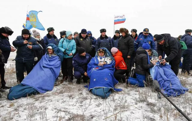 the international space station iss crew of alexander gerst of germany l r maxim surayev of russia and reid wiseman of the us rest after landing in a remote area near the town of arkalyk in northern kazakhstan on november 10 2014 photo reuters the international space station iss crew of alexander gerst of germany l r maxim surayev of russia and reid wiseman of the us rest after landing in a remote area near the town of arkalyk in northern kazakhstan on november 10 2014 photo reuters
