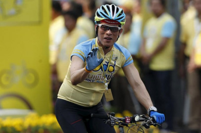 thai crown prince leads mass cycling event for dad