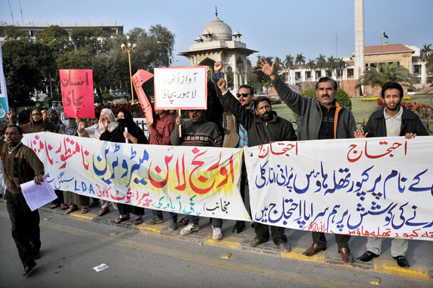 protesters say those living along the route will be affected by land acquisition photo express