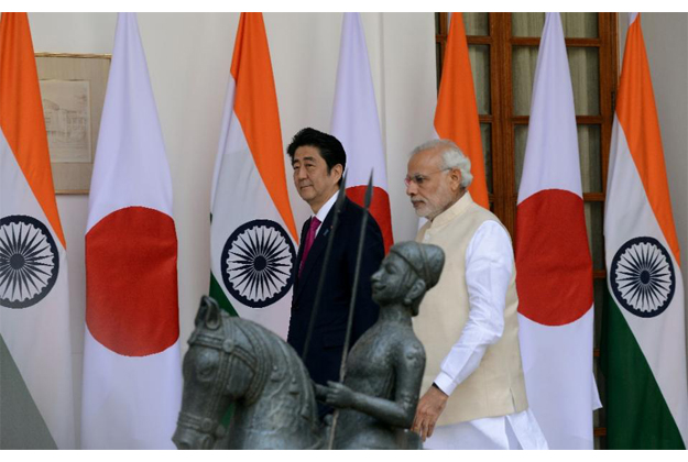 india 039 s prime minister narendra modi walks with japan 039 s prime minister shinzo abe at hyderabad house in new delhi on december 12 2015 photo afp