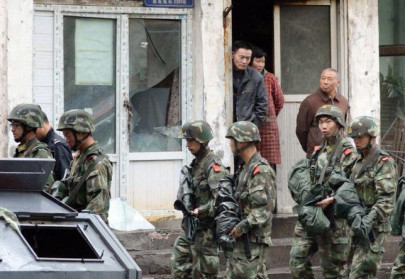 china says senior uighur official killed during raid in unruly xinjiang