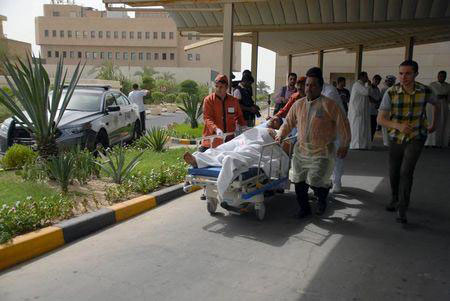 a victim of a suicide bomb attack at imam al sadeq mosque arrives at the amiri hospital in al sharq kuwait city june 26 2015 photo reuters