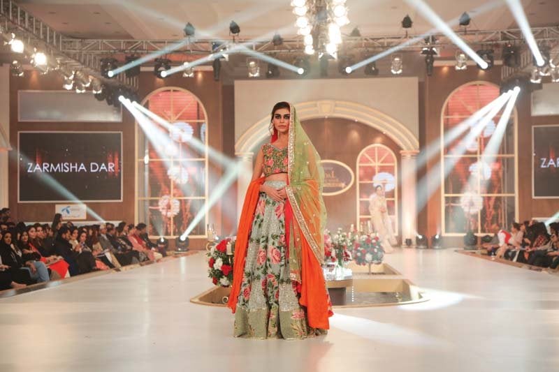 zarmisha dar s light green and pink lehenga choli were among the visually appealing numbers of the evening photo publicity