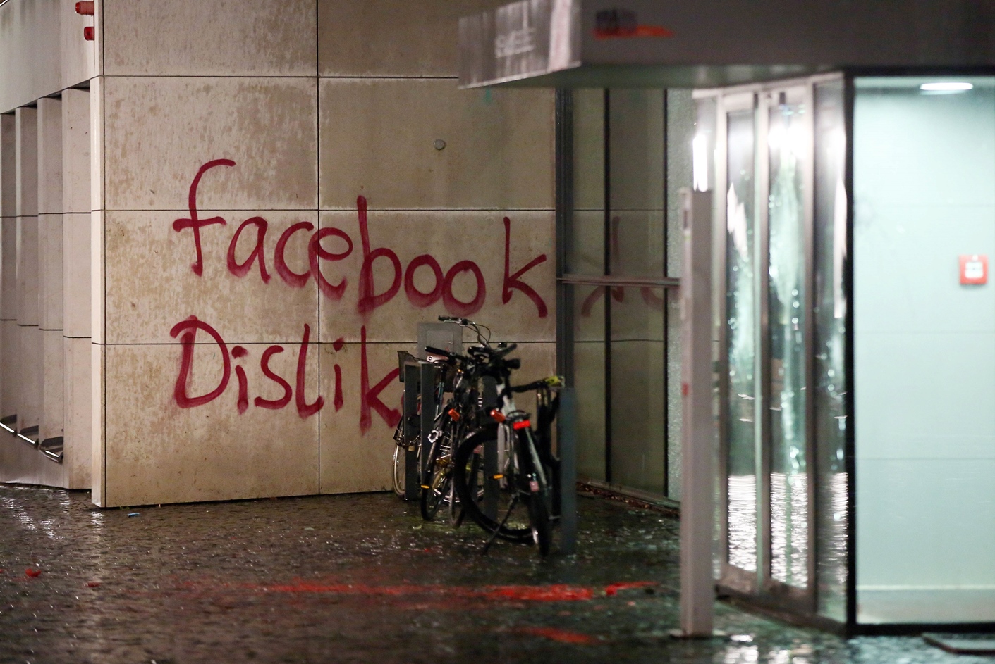 the message quot facebook dislike quot is written on the wall of a building where us social media giant facebook has its german headquarters in hamburg northern germany on december 13 2015 photo afp