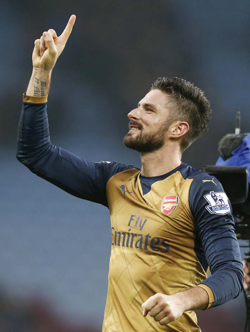 arsenal go to 33 points after 16 games with a win over aston villa as olivier giroud continued his incredible form with a goal photo reuters