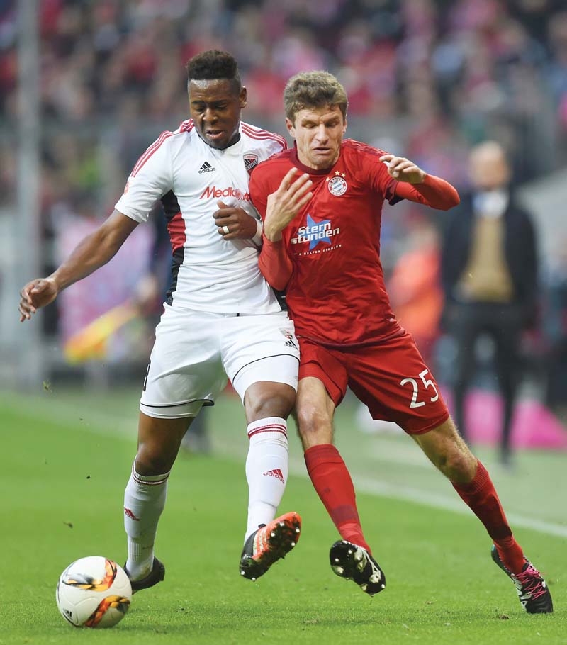 lewandowski opened the scoring while lahm doubled the lead 15 minutes from time to ensure bayern remain on top ahead of the winter break photo afp