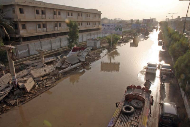 university road was inundated on saturday evening when a water supply line measuring 84 inches in diameter burst near the federal urdu university of arts science and technology photo athar khan express university road was inundated on saturday evening when a water supply line measuring 84 inches in diameter burst near the federal urdu university of arts science and technology photo athar khan express