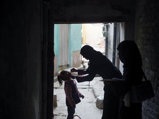 vaccinators in 6 463 mobile teams will go door to door to give oral polio vaccine to children in various neighbourhoods across the province photo afp