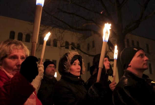 demonstrators take part in a protest organised by a jewish group against a planned statue of balint homan in szekesfehervar hungary december 13 2015 photo reuters