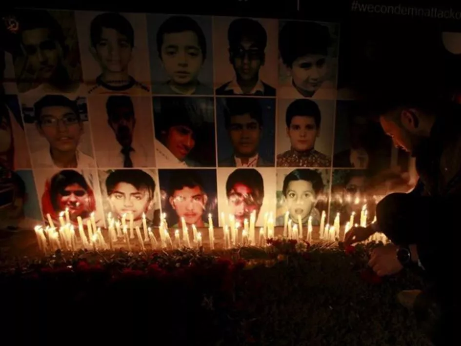 file photo of a vigil for peshawar attack victims photo reuters file photo of a vigil for peshawar attack victims photo reuters