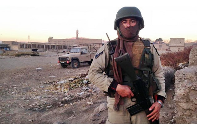 a security personnel standing guard at the site of bomb blast which killed 25 persons on sunday photo online a security personnel standing guard at the site of bomb blast which killed 25 persons on sunday photo online