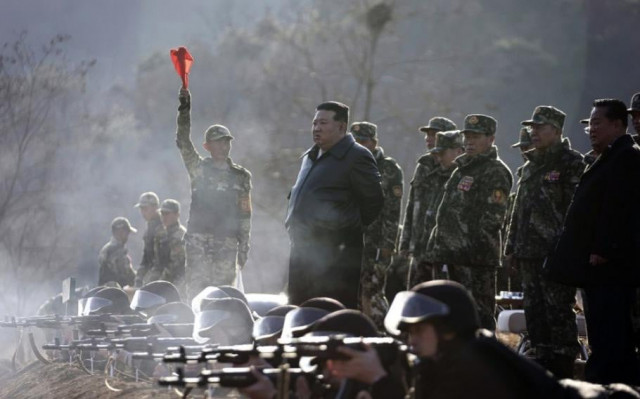 north korean leader kim jong un watches troops fire their rifles at an undisclosed military base march 6 2024 photo korean central news agency north korean leader kim jong un watches troops fire their rifles at an undisclosed military base march 6 2024 photo korean central news agency