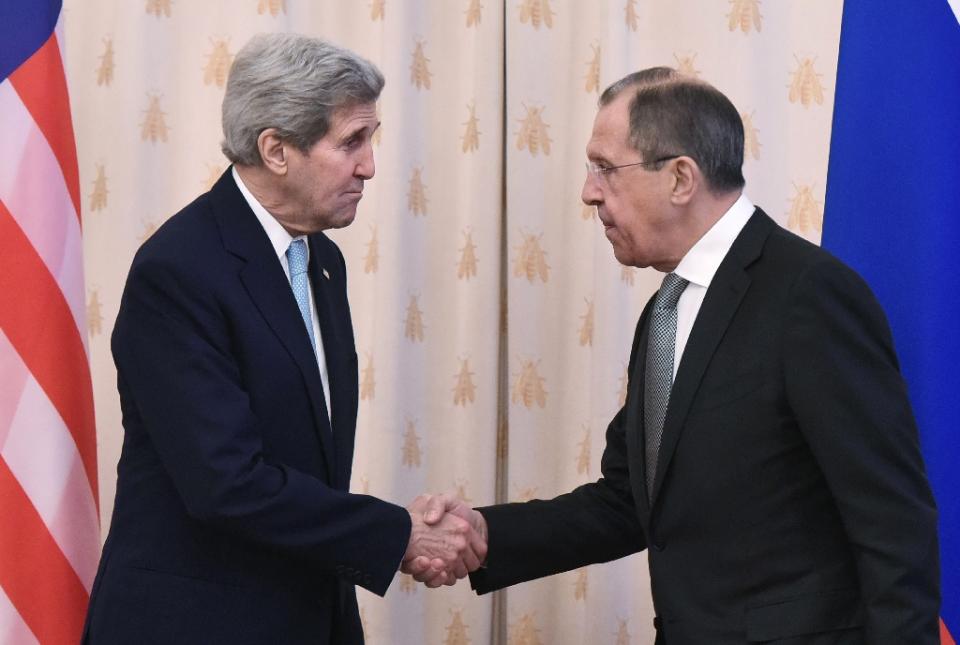 us secretary of state john kerry l and russian foreign minister sergei lavrov shake hands ahead of a bilateral meeting at the ministry of foreign affairs in moscow on december 15 2015 photo afp