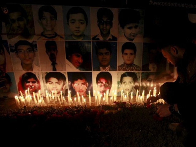 file photo of a vigil for peshawar attack victims photo reuters file photo of a vigil for peshawar attack victims photo reuters