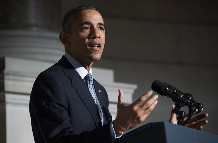 us president barack obama speaks during a naturalization ceremony at the national archives in washington dc december 15 2015 on the 224th anniversary of the bill of rights photo afp