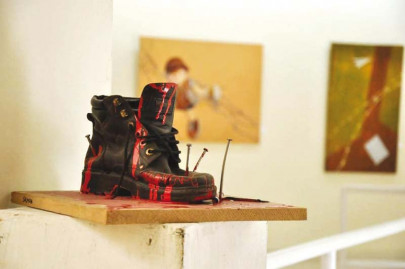 of poignant creations jacket shoe of aps victim used in artwork of poignant creations jacket shoe of aps victim used in artwork