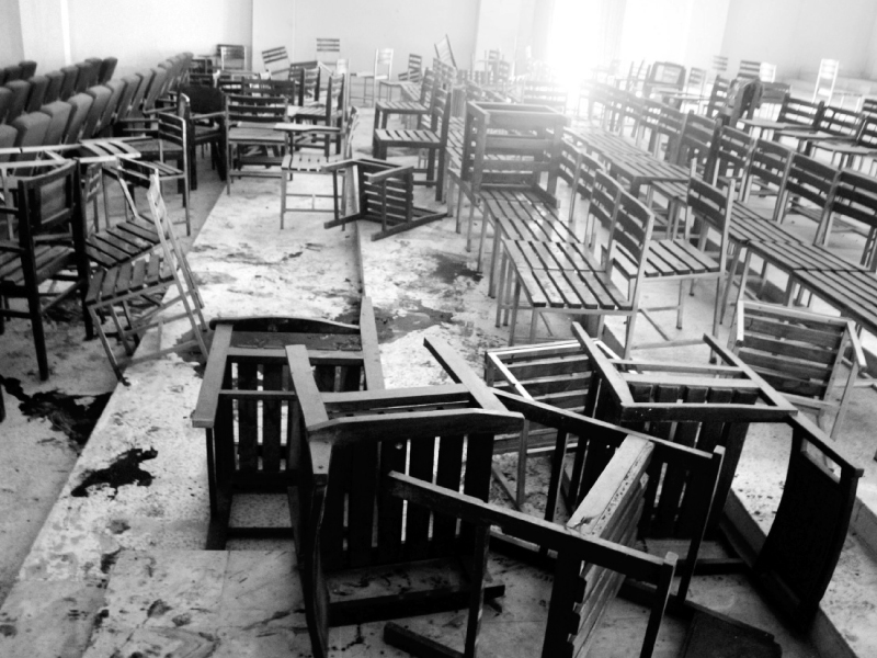 overturned tables and chairs in a classroom at the taliban stricken army public school photo muhammad iqbal express
