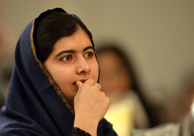 pakistani activist for female education and nobel peace prize laureate malala yousafzai listens to speakers at an event to commemorate the peshawar school massacre in birmingham north england on december 14 2015 photo afp