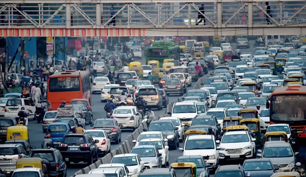 in this photograph taken on october 15 2015 commuters in their vehicles clog the roads of new delhi photo afp in this photograph taken on october 15 2015 commuters in their vehicles clog the roads of new delhi photo afp