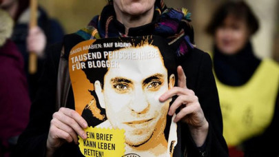 saudi blogger s wife accepts eu sakharov prize for jailed husband