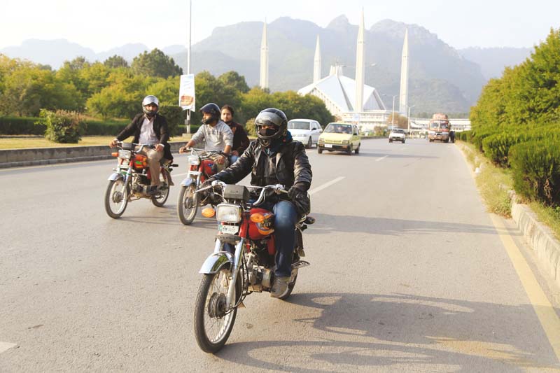 a woman riding a bike is a rare sight in pakistan photo muhammad daud khan