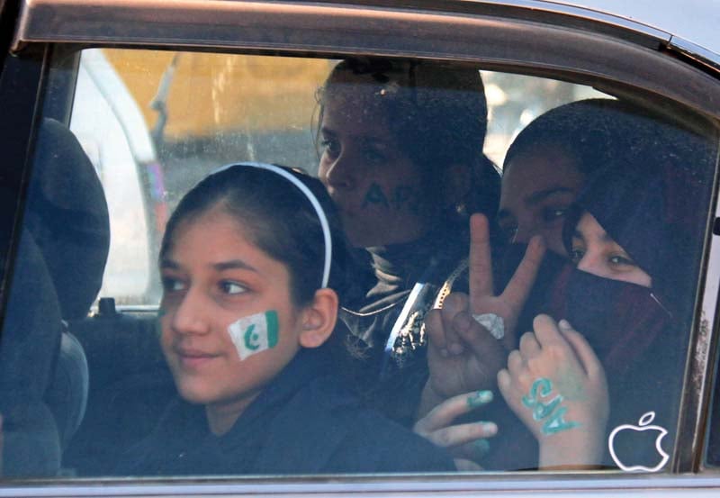 a student travels in a car outside the army public school photo muhammad iqbal express