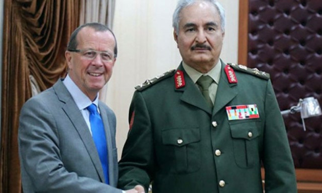 general khalifa haftar r commander of the armed forces loyal of the internationally recognized libyan government shakes hands with un envoy martin kobler the head of the un support mission in libya in the eastern town of al marj about 80 km east of the mediterranean port city of benghazi on december 16 2015 photo afp general khalifa haftar r commander of the armed forces loyal of the internationally recognized libyan government shakes hands with un envoy martin kobler the head of the un support mission in libya in the eastern town of al marj about 80 km east of the mediterranean port city of benghazi on december 16 2015 photo afp