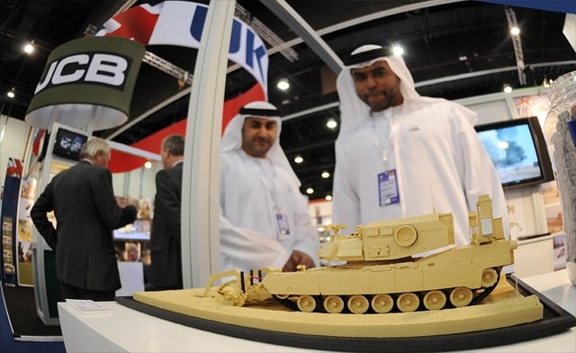 visitors look at a miniature model of an armored vehicle on display during the international defense exhibition and conference idex at the abu dhabi national exhibition centre feb 18 2013 photo reuters visitors look at a miniature model of an armored vehicle on display during the international defense exhibition and conference idex at the abu dhabi national exhibition centre feb 18 2013 photo reuters