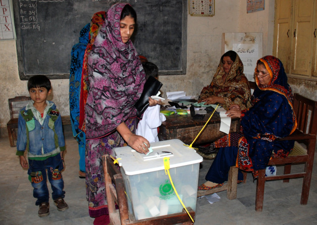 a woman is casting her vote in lg election in hyderabad on december 17 2015 photo shahid ali express a woman is casting her vote in lg election in hyderabad on december 17 2015 photo shahid ali express