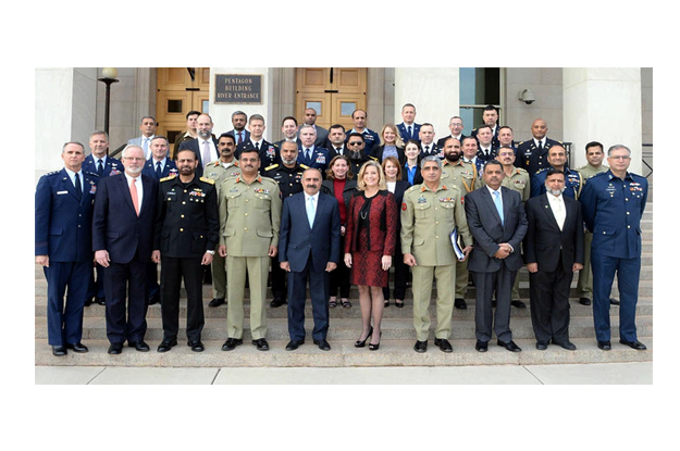 secretary defence lt general retd muhammad alam khattak in a group photo with us defence officials in washington photo inp