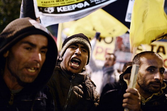migrants stranded in greece and mainly from marocco and algeria shout 039 open the borders 039 while participating in a rally in central athens on december 18 2015 organised by pro migrant organisations on the occasion of the international migrants day photo afp migrants stranded in greece and mainly from marocco and algeria shout 039 open the borders 039 while participating in a rally in central athens on december 18 2015 organised by pro migrant organisations on the occasion of the international migrants day photo afp