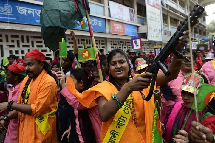 a bangladeshi woman dances as she participates in a rally to mark the country 039 s 44th victory day in dhaka on december 16 2015 photo afp