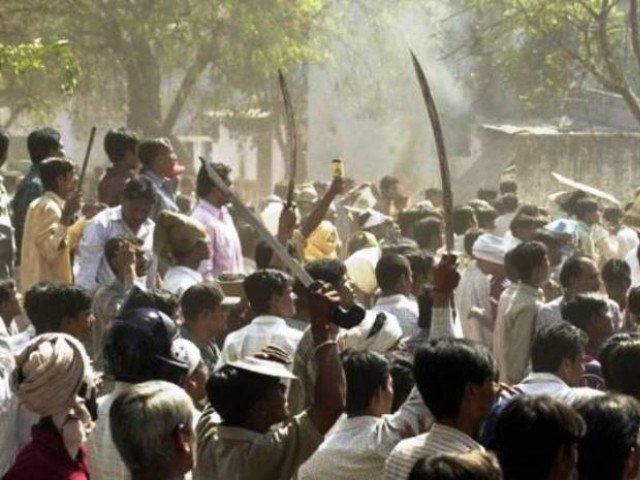 human rights groups say more than 2 000 people mainly muslims were hacked beaten or burned to death during the gujrat riots photo afp